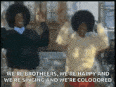 a couple of people are singing and dancing with the words we 're brothers , we 're happy and we 're singing