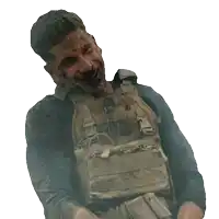 a man wearing a tactical vest is laughing with a white background