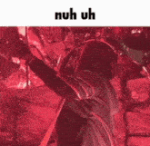 a person playing a drum set with the words nuh uh below them