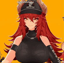 a girl with red hair is wearing a black hat that says rockstar on it