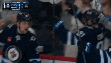 a hockey game is being played and the score is empty net