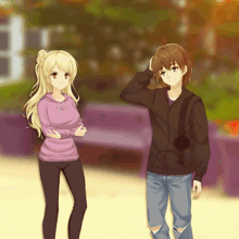 a boy and a girl standing next to each other