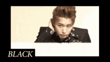 a picture of a young man with the word black on the bottom right