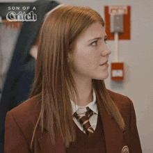 a woman in a school uniform with the words son of a critch on the bottom
