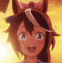 a close up of a girl with a horse 's headband on her head