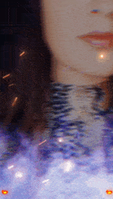 a blurry picture of a woman 's face with a reflection of her in the water
