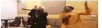 a couple of people are dancing in a room with a guitar .
