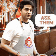 a man with an apron that says one happy insaan