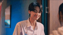 a boy in a white shirt with the number 43781 on the front