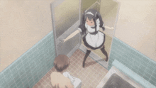 a maid stands in a bathroom next to a man