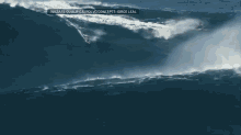 Surfer Rides World Record Wave. GIF