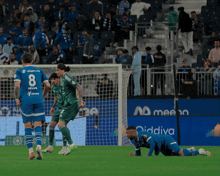 a soccer player with the number 8 on his back