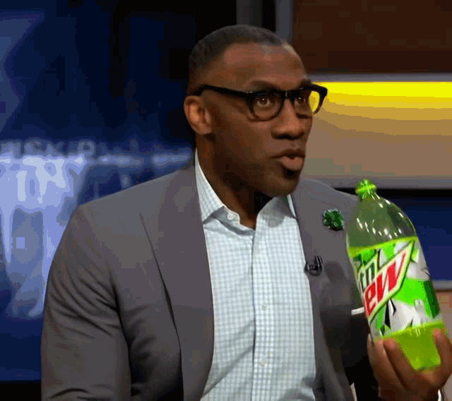 shannon-sharpe-drinking-soda.gif