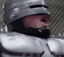 a close up of a person wearing a helmet .