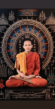 a man in a red robe sits in front of a circular design