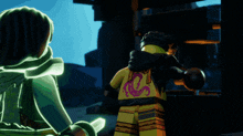 a lego figure with a snake on the back of his shirt