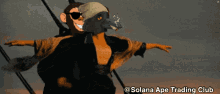 a cartoon of a monkey and a bird with the words solana ape trading club