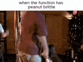 a picture of a man holding a peanut brittle