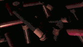 a bunch of shotgun shells are laying on the ground