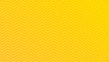 a yellow background with a yellow chevron pattern .
