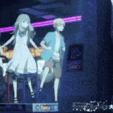 a man and a woman are dancing in front of a dance sign