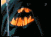 a close up of a batman logo on a pole