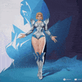 a woman in a silver and blue outfit is standing in front of a blue and white background with the words rotate and show below her