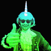 a man wearing a green unicorn hat and sunglasses gives a thumbs up