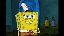 a cartoon of spongebob wearing a sailor hat and tie .