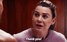 a woman is talking to a man and saying `` thank you ! ''