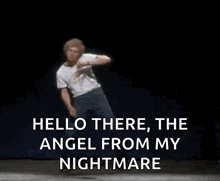 a man is dancing on a stage with the words hello there , the angel from my nightmare above him .
