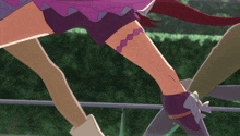 a close up of a girl 's leg with a purple heart tattoo on it