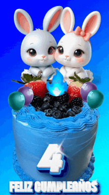 a birthday cake with two bunny rabbits on top and the number 4 on it