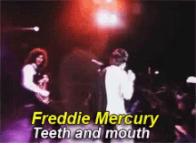 a video of freddie mercury 's teeth and mouth performing