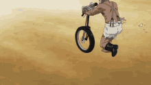 a man without a shirt is riding a motorcycle on a dirt road