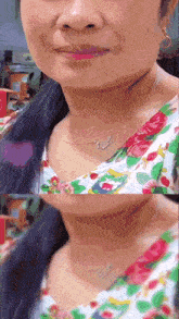 a close up of a woman wearing a necklace and a floral top