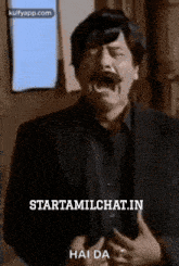a man with a mustache is making a funny face with the words hai da on the bottom
