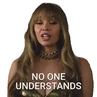 a woman with long hair and a necklace says no one understands