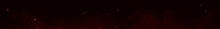 a close up of a red lightning bolt on a black background