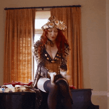 a woman with red hair is wearing a hat and stockings