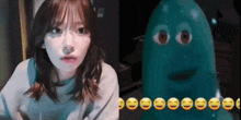 a girl next to a picture of a monster with smiley faces