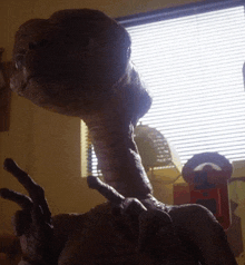 a statue of a dinosaur with a very long neck