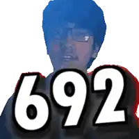 a pixelated image of a man with the number 692 on his chest