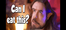 a man with long hair and a beard is asking " can i eat this "