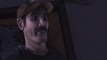 a group of men are standing around a man in a video game .