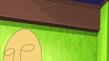 a cartoon drawing of a man 's face against a green wall