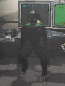 a pixelated image of a man standing in front of a green screen that says ' city '