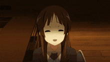 a girl in a suit and tie is making a face