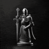 a statue of a knight with a white cape and helmet