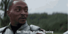 a man says oh they 're malfunctioning in front of trees